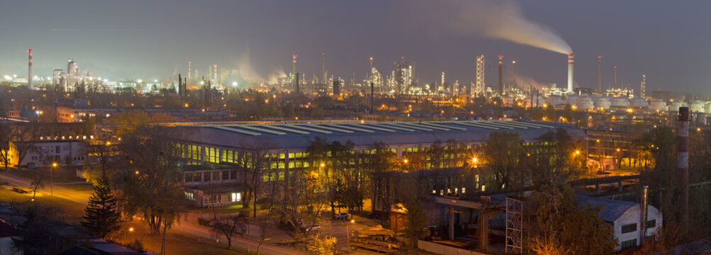 Bratislava - The panorama of oil refinery Slovnaft in Slovakia in evening dusk