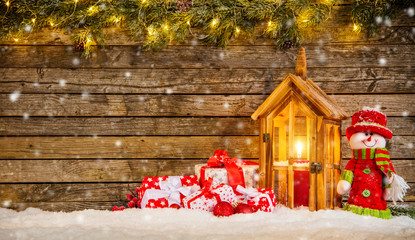 Christmas background with snowman and lantern