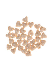 many muesli in heart shape on white background