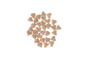 many muesli in heart shape on white background
