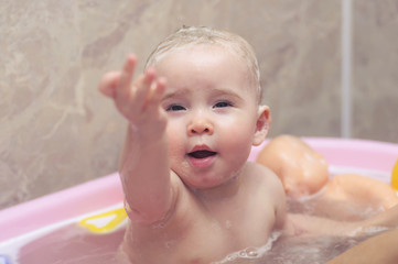 Bathing little baby