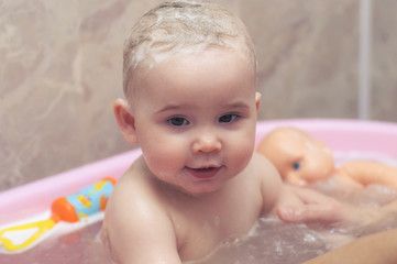 Bathing little baby