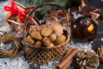 Winter Christmas nuts is wicked basket on white ice