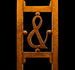 Ampersand, et ligature of the Latin for 