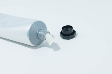 Tube packaging is used for dispensing cream or toothpaste.