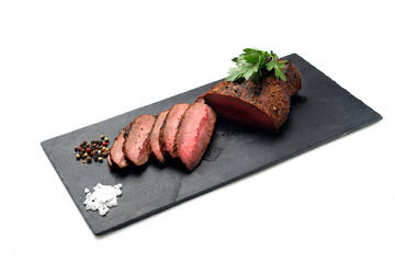 grilled steak on a black slate