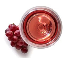 Rolgordijnen Glass of rose wine and grapes © baibaz