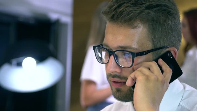 Businessman talking on cell phone
