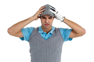 Frustrated golf player standing on white background