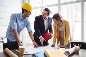 Businessman with coworkers at office