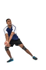 Fototapeta na wymiar Sportsman posing while playing volleyball