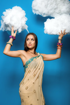 Portrait of young woman dressed in traditional indian style