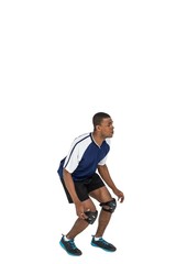 Obraz na płótnie Canvas Sportsman posing while playing volleyball