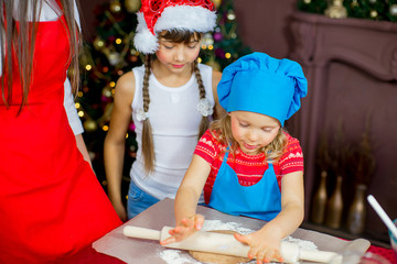 children baking christmas cookies