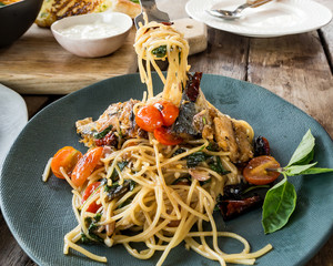 Spaghetti pasta with mackerel and tomato sauce