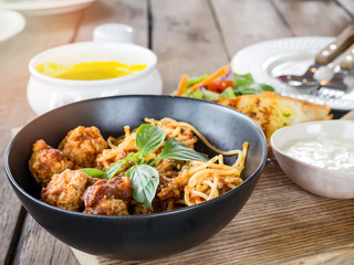 Spaghetti pasta with meatballs and tomato sauce