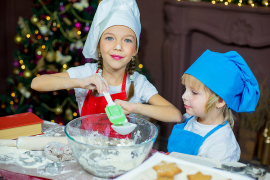 children baking christmas cookies