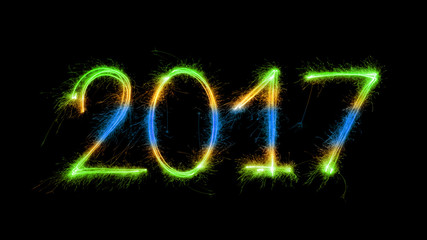 Happy New Year Brazil - 2017 with sparklers on black background. Flag of Brazil