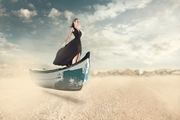 Fantasy portrait of young woman in the boat