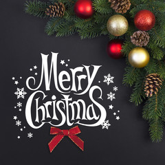 Christmas tree with decorations on a black background