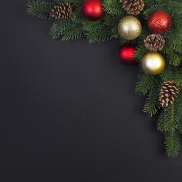 Christmas tree with decorations on a black background