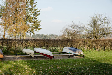 Boats on a row on land