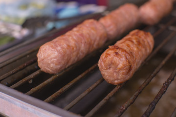 Grilled sour sausage. Food in Thailand