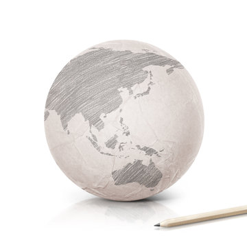 Shade Asia & Australia map on paper globe on white background