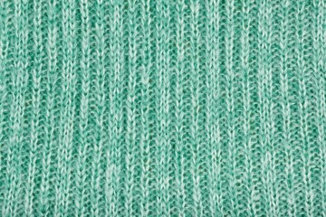Knitted fabric textured background.