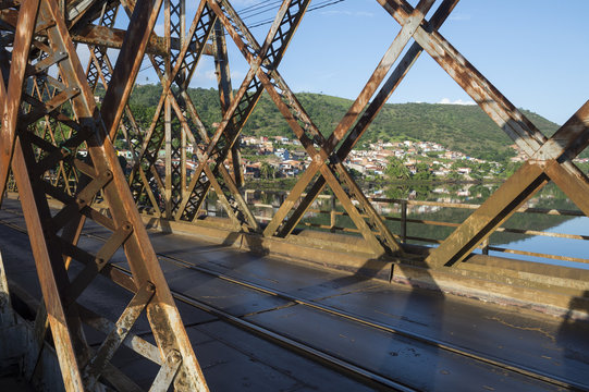 View from the rustic Dom Pedro II iron bridge joining the historic town of Cachoeira with São Félix, divided by the Rio Paraguaçu River in Bahia, Brazil
