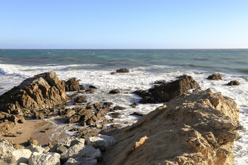 Fototapeta na wymiar Rocks and waves at Leo Carrillo State Beach, Malibu California