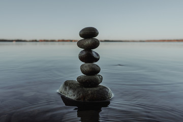 Rock stack resting off the shore of Delta Lake in Rome, NY.