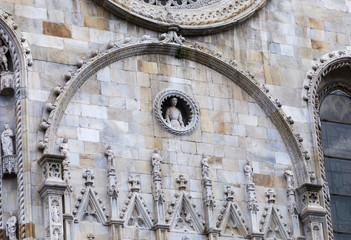 Facade of Cathedral in Como city, Lombardy, Italy. Exterior in from of the cathedral.