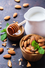 Almond milk with ingredients for healthy breakfast