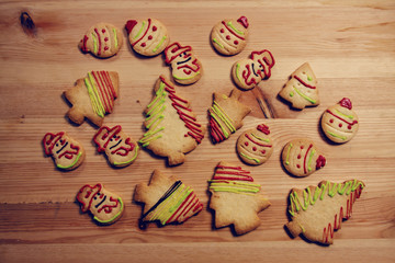 Christmas homemade gingerbread cookies on wooden table