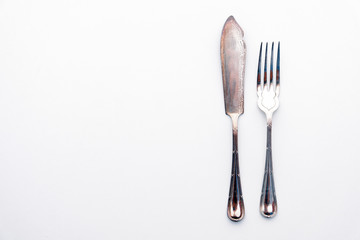 knife and fork isolated on white - beautiful silver cutlery