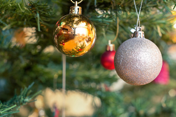 christmas tree decorations hanging on christmas tree