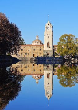 Argentina, Cordoba Province, Alta Gracia, View of El Tajamar Water Reservoir build by Jesuits, the Clock Tower and the Jesuit Estancia.