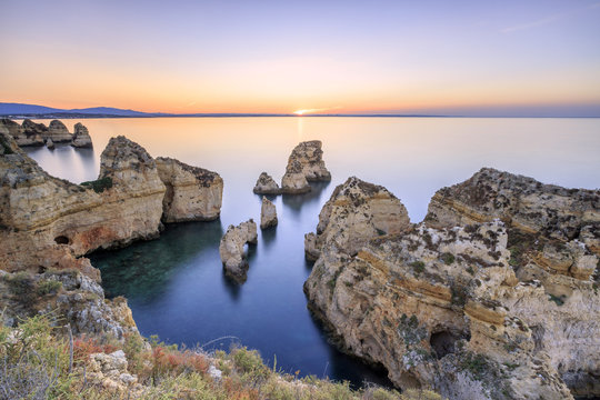 Dawn on cliffs of Ponta da Piedade, Lagos, Algarve, Portugal