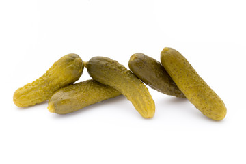 Marinated pickled cucumbers isolated on the white.