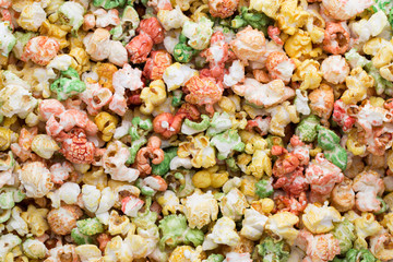 Colored Popcorn texture background. Sweet popcorn.