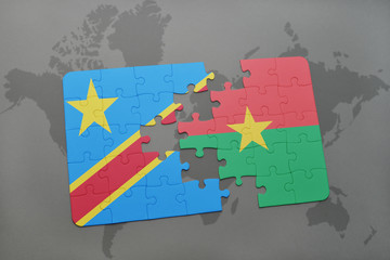 puzzle with the national flag of democratic republic of the congo and burkina faso on a world map