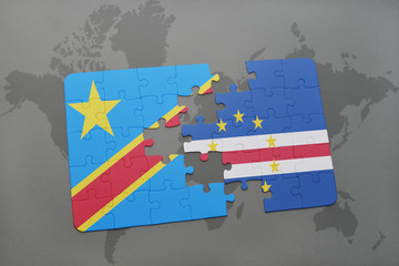 Obraz premium puzzle with the national flag of democratic republic of the congo and cape verde on a world map