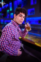 Portrait of man drinking beer