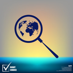 Analyzing the world. Magnifier glass with globe