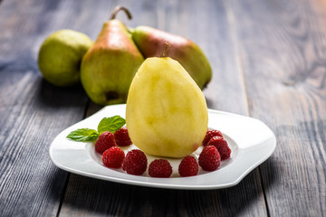 homemade dessert - pear with raspberries