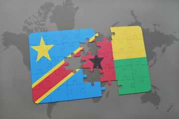 puzzle with the national flag of democratic republic of the congo and guinea bissau on a world map