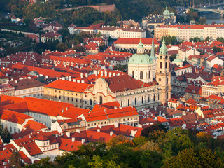 Fototapeta na wymiar Aerial view of the Lesser Town, aka Mala Strana, with St Nicholas Church in Prague, capital city of Czech Republic, Europe. UNESCO World Heritage Site