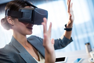 Businesswoman using an oculus