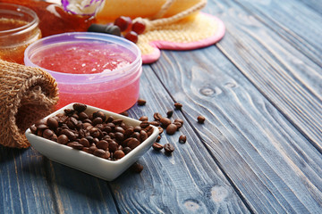 Body care set for peeling on wooden background, closeup